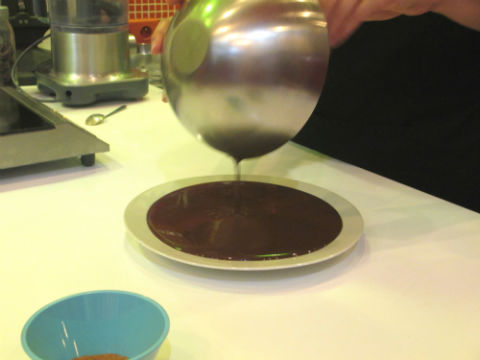 Pouring the chocolate filling to let it cool
