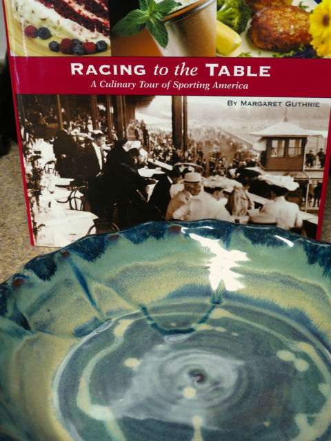 My copy of the book Racing to the Table and my Kentucky-made pie plate